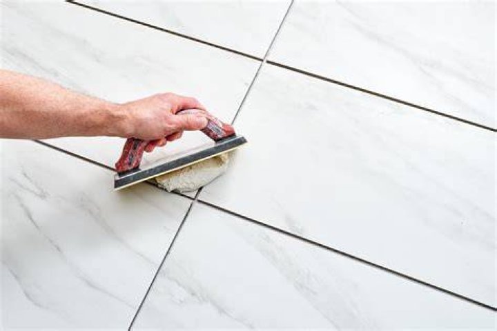 Can you grout floor tile the same day