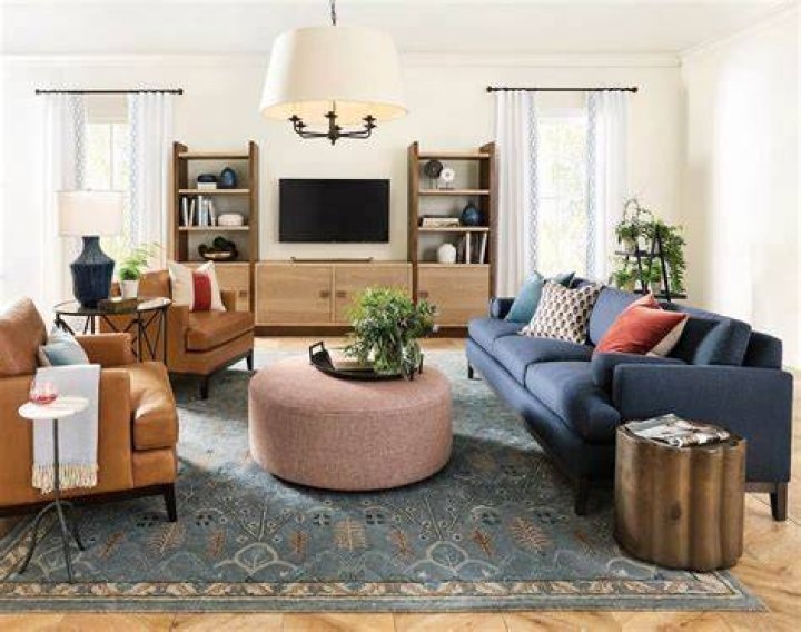 Where should end tables be placed in living room